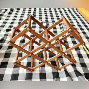 vintage accordion-style wooden wine rack